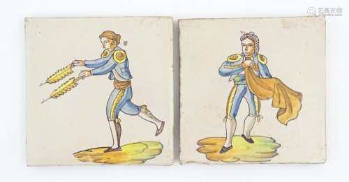 A pair of Spanish tiles with hand painted bullfigh…
