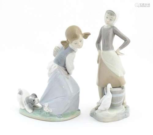 Two Lladro figures comprising Girl with Milk Pail,…