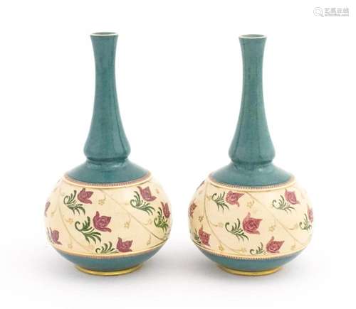 A pair Royal Doulton bottle vases with turquoise g…