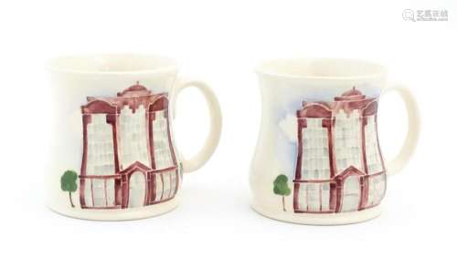 Two commemorative Moorcroft mugs depicting Beaufor…
