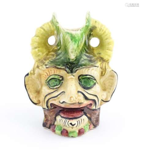 A Thomas Forester & Sons majolica figural devil he…