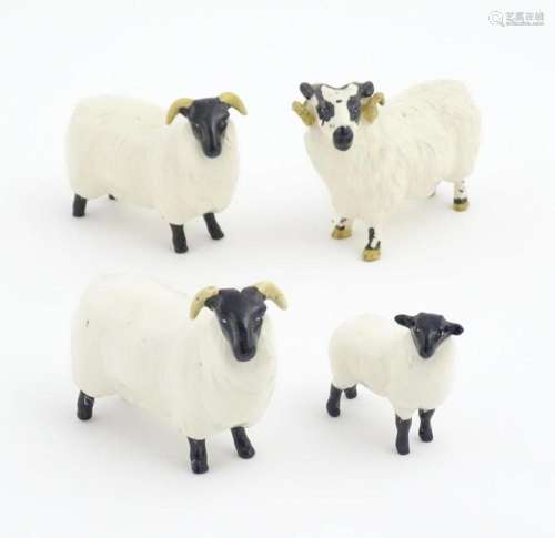 Four Beswick sheep comprising a ram, two ewes and …