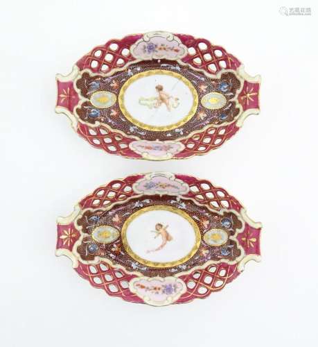 Two Vienna pottery dishes with central cherub / pu…