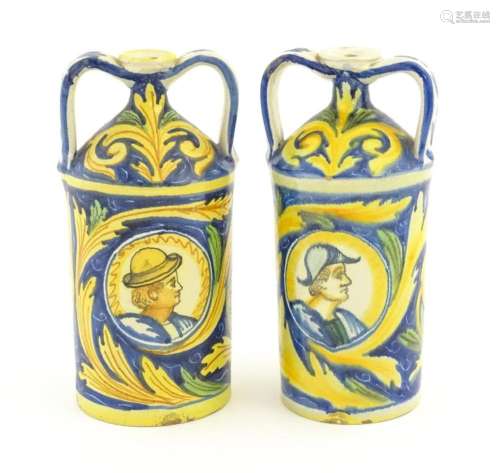 Two Italian maiolica twin handled bottle jars, eac…