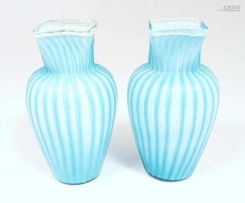 Two turquoise trailed glass vases. Approx 9 1/4" h…