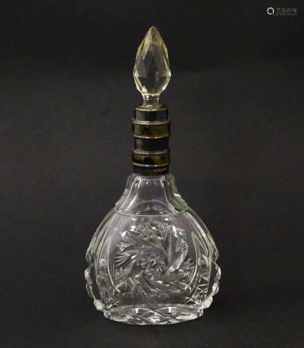 A cut glass scent / perfume bottle and stopper, th…