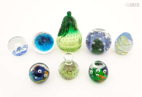 Eight assorted glass paperweights, one signed Mdin…