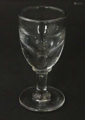 A toast master's glass. Approx. 4" high …