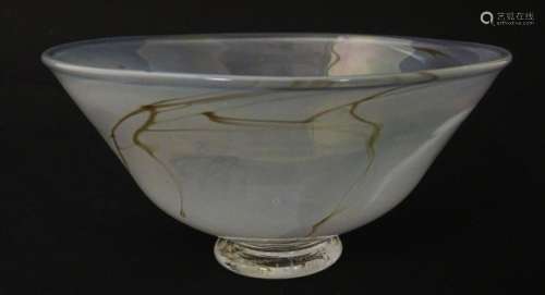 An art glass bowl with marbled detail. Approx. 3" …