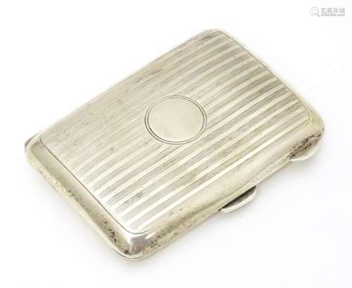 A silver cigarette / cheroot case with banded eng…