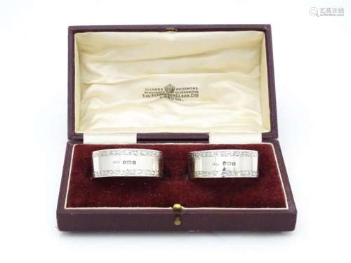 A cased pair silver napkin rings hallmarked Birmi…