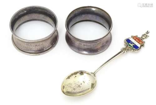 Two silver napkin rings, one hallmarked Birmingham…