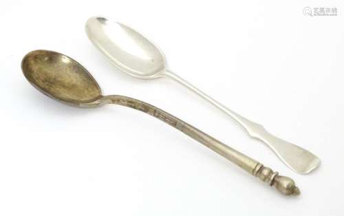A Russian silver spoon with engraved decoration to…