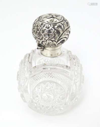 A Victorian cut glass scent / perfume bottle with …