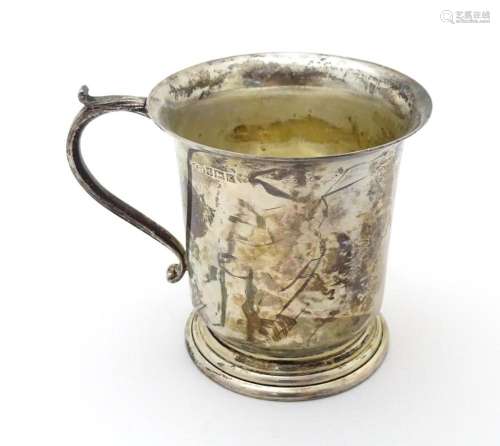 A silver christening mug hallmarked Birmingham 193…