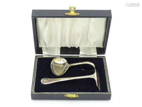 A cased silver Christening set comprising child's …
