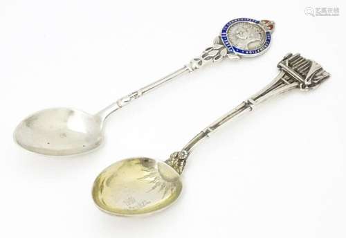 A silver souvenir teaspoon commemorating the 1911 …