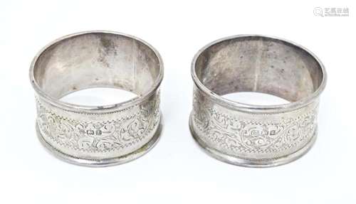 Two silver napkin rings with engraved acanthus scr…