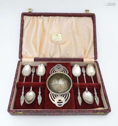 A set of Six silver teaspoons with floral detail t…