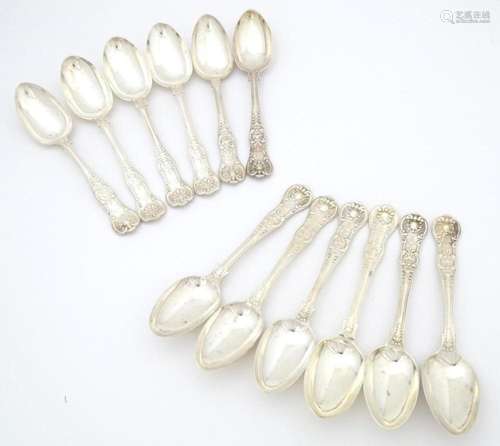 Twelve associated Victorian silver Kings pattern d…