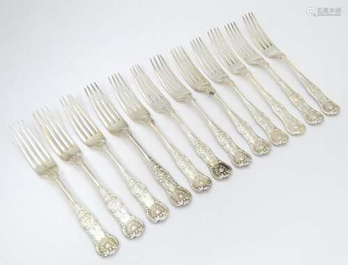 Twelve associated Victorian silver Kings pattern d…