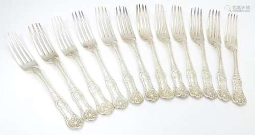 Twelve associated Victorian silver Kings pattern t…