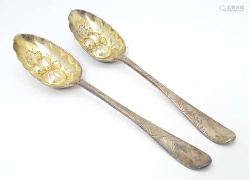 A pair of Geo III Scottish silver berry spoons wit…