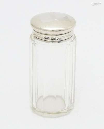 A glass toilet / dressing table jar with silver li…