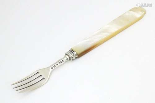 A Victorian silver fork with mother of pearl handl…