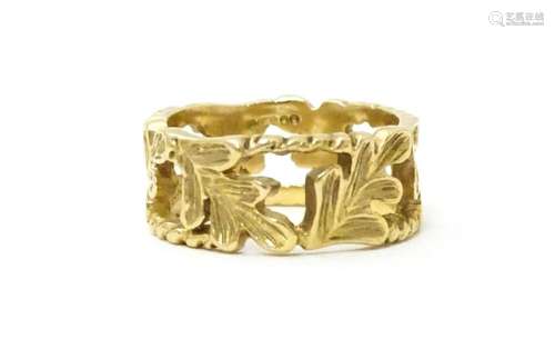 A 9ct gold ring with oak leaf detail. Ring size ap…