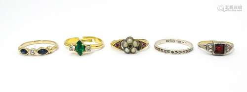 Five assorted rings to include to include a silver…