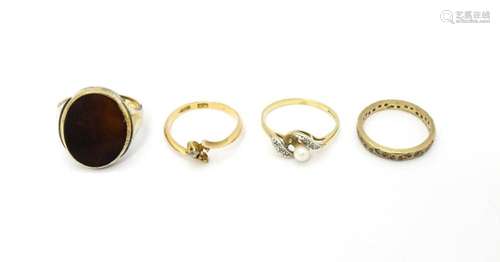 Four assorted rings comprising three 9ct gold exam…