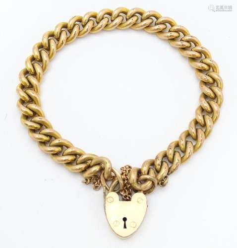 A gold plated bracelet by Pioneer with patent no. …