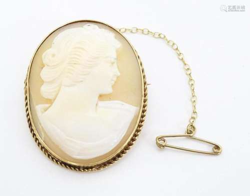 A 9ct gold cameo brooch. Approx. 1 1/2" …