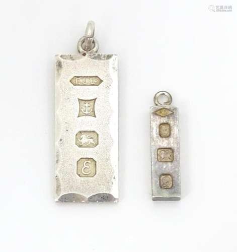 Two silver pendants of ingot form, one hallmarked …