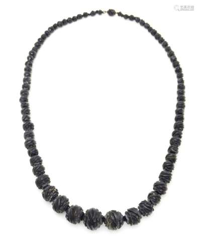 A Victorian Whitby Jet bead necklace. Approx. 32" …