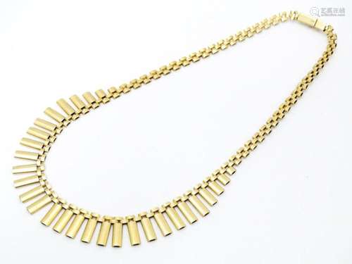 A 9ct gold necklace formed as a Cleopatra collar. …