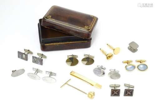A leather stud box containing assorted cufflinks e…