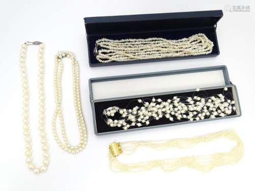 Five various pearl necklaces, to include examples …