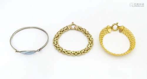 Three assorted silver bracelets to include two sil…