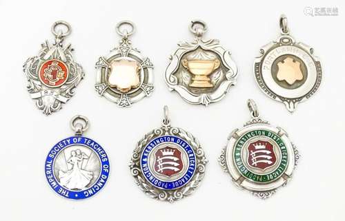 Seven assorted hallmarked silver trophy fobs to in…