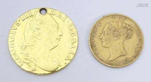 Coin: A Victorian 1869 gold half sovereign coin. A…