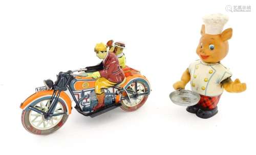 Toys: Two 20thC tinplate clockwork toys to include…