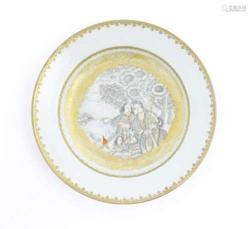 A Chinese export plate decorated in grisaille with…