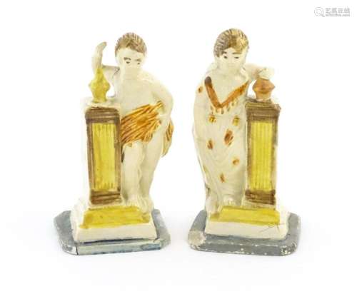 A pair of English creamware pottery Classical figu…