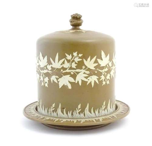 A Wedgwood Jasperware style brown and white cheese…