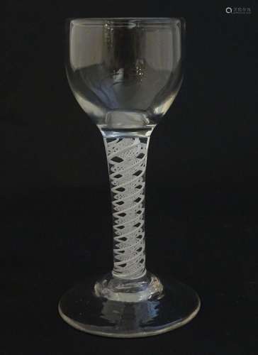 A 19thC pedestal drinking glass with twist detail …