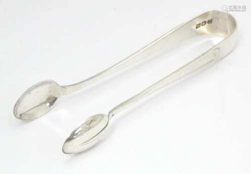 Silver sugar tongs hallmarked London 1909, maker H…