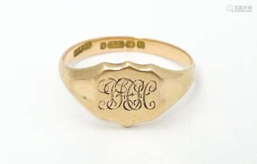 A 9ct gold signet ring. Ring size approx. N …