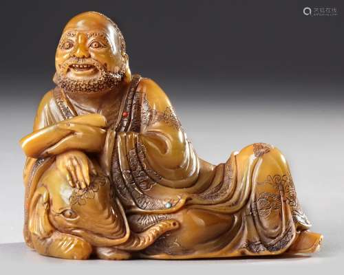 A CHINESE SOAPSTONE CARVED LUOHAN, 20TH CENTURY